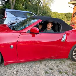 Nissan 370Z Convertible Red. 2012. 25,000 miles.