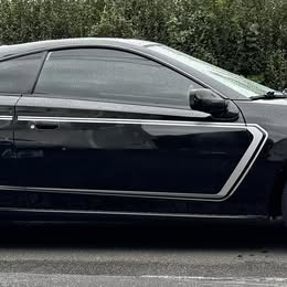 2002 Black Toyota Celica w\/ Racing Stripes , Manual transmisi\u00f3n.