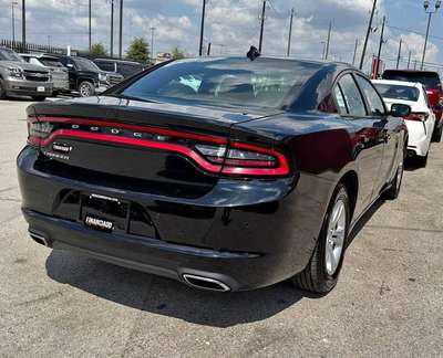 2023 black dodge charger SXT V6 63,000 millas 4,000  down payment w.a.c