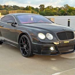 2005 Sleek Black Bentley Continental GT custom wheels red interior