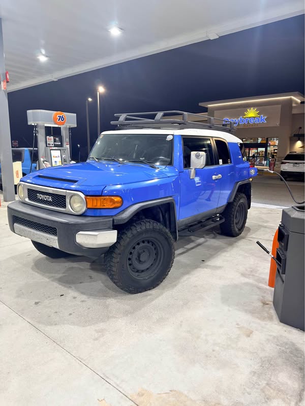 Blue Toyota FJ Cruiser with roof rack.  2007 Toyota FJ Cruiser 4x4 - Clean Title - Well Maintained P
