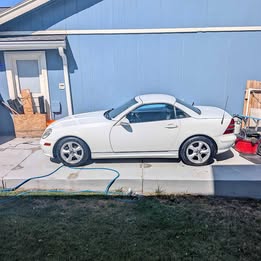 2001 Mercedes-Benz  SLK 320 with only 130k miles.