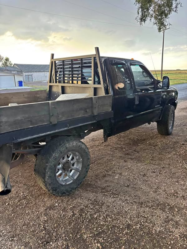 2001 Ford E350 Super Duty Passenger - Cabina y media