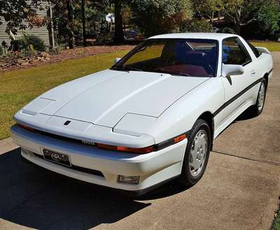 1988 Toyota Supra MK3 non-turbo 5 speed 41K miles. This ride is totally stock. No molestation.  :)