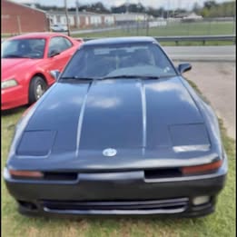 1991 Toyota Supra with enclosed trailer