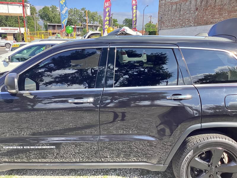 2015 Jeep Grand Cherokee - 5.9 Limited Sport Utility 4D