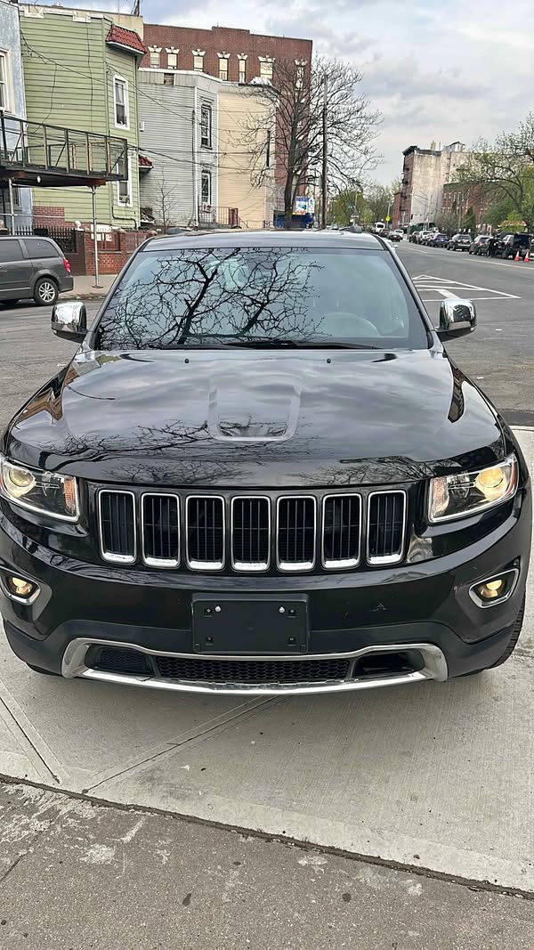 2015 Jeep Grand Cherokee - 5.9 Limited Sport Utility 4D