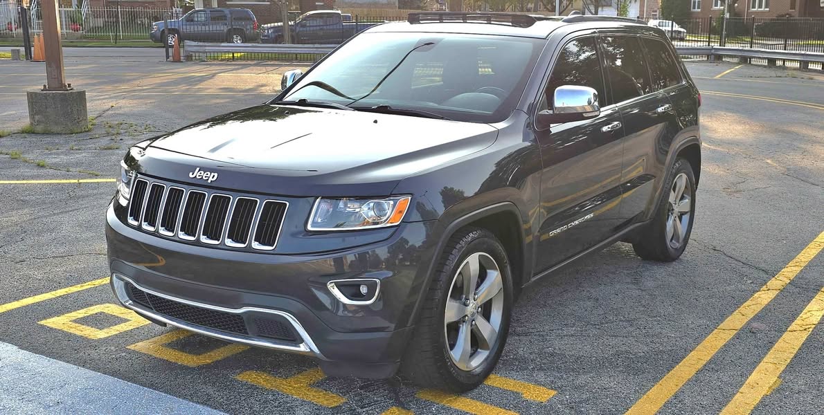 2014 Jeep Grand Cherokee - 5.9 Limited Sport Utility 4D