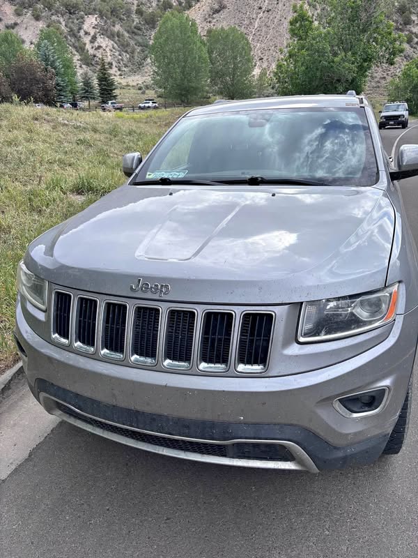 2015 Jeep Grand Cherokee - 5.9 Limited Sport Utility 4D