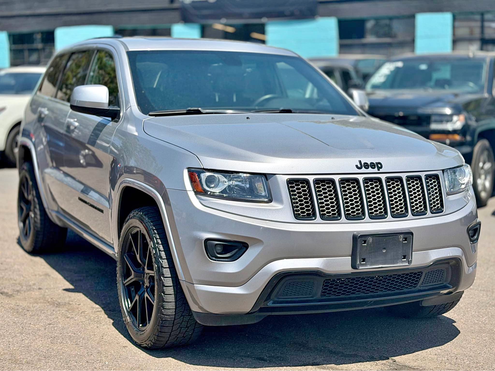2014 Jeep Grand Cherokee - Altitude Sport Utility 4D