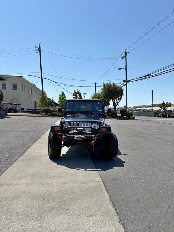 1998 Jeep Wrangler - Black & Tan SUV 2D