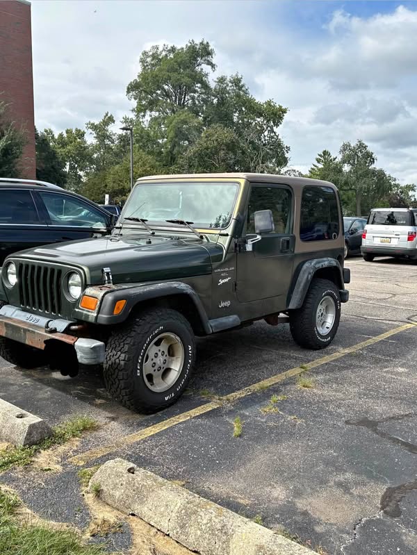 1997 Jeep Wrangler - Black & Tan SUV 2D